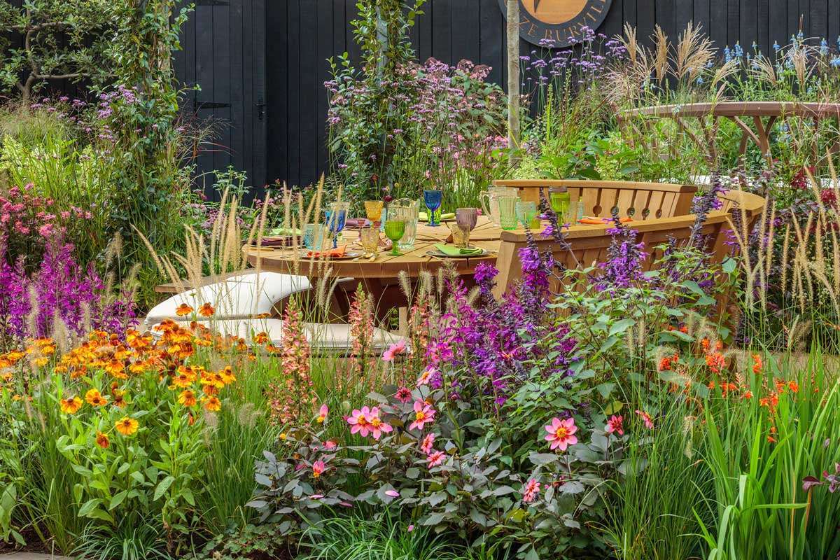 Hampshire based Gaze Burvill's dining table at Chelsea 2021 with garden by Ann-Marie Powell