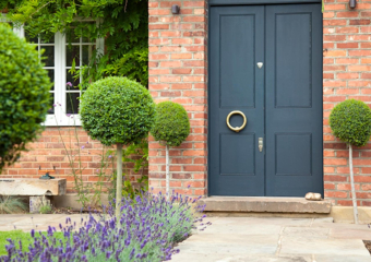 French style garden pathway, purple flowers, clean cut lawn designed by Ann- Marie Powell, July, UK 2009